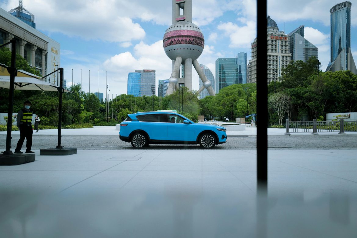 Two of China’s largest state-owned automakers, Dongfeng Motor and Changan Automobile, are in advanced discussions to merge, a deal that could create a powerful new player in the global auto industry while raising concerns for their American and Japanese partners. <a href="https://www.nytimes.com/2025/04/01/business/dongfeng-changan-china-auto-merger.html">The New York Times reported</a> Tuesday that the two companies have held detailed negotiations and informed their foreign partners of their plans, according to sources familiar with the matter.The merger would represent a major consolidation of China’s automotive sector, the world’s largest, as Beijing pushes for greater efficiency and an accelerated transition to electric vehicles (EVs). Both Dongfeng and Changan currently have excess production capacity for gasoline-powered vehicles, and the Chinese government sees <a href="https://invezz.com/news/2025/02/10/china-dongfeng-motor-shares-rocket-85-percent-today-heres-why/">their union</a> as a way to phase out older plants while bolstering EV production.Together, Dongfeng and Changan manufacture about five million cars annually—more than Ford Motor and nearly as many as General Motors or Stellantis, the parent company of Fiat, Chrysler, and Peugeot. Despite their scale, both companies have struggled with underutilized production lines. A merger would allow the companies to consolidate operations, reduce costs, and compete more effectively with China’s growing roster of private EV makers such as <a href="https://invezz.com/news/2025/03/26/this-automaker-is-seeing-the-most-explosive-growth-in-100-years-heres-why/">BYD</a> and <a href="https://invezz.com/news/2025/03/31/nio-stock-price-has-crashed-is-it-safe-to-buy-the-dip/">Nio</a>.If Dongfeng and Changan are successfully reorganized, the new auto group will have annual sales of about 4.58 million units and will overtake BYD to become China’s No. 1 carmaker, as well as the world’s fifth-largest auto group, 36kr said in an earlier report.Foreign partnerships with Ford, Nissan, and Honda under scrutinyThe proposed merger has raised concerns among the companies’ foreign partners. Changan has been Ford’s primary partner in China for over two decades, while Dongfeng has long-standing joint ventures with Nissan and Honda. If the newly merged entity shifts focus toward independent EV production, these partnerships could be disrupted, affecting foreign automakers’ presence in the Chinese market.The deal could also attract attention from the United States. Changan is owned by China South Industries Group, a military contractor, while Dongfeng is a key supplier of military vehicles to the People’s Liberation Army (PLA). The merger could result in a larger state-backed military supplier, heightening scrutiny from the Trump administration and potentially complicating trade relations between China and the US.China’s overcapacity in auto production is not sustainableChina has been grappling with a surplus of auto production capacity, fuelled by state-backed loans that have allowed automakers to expand aggressively. While demand for EVs has surged—accounting for over half of all car sales in China since mid-2024—traditional gasoline vehicle sales have struggled. “The Chinese auto sector is at the start of a sweeping consolidation. We believe capacity cuts are necessary to restore profits, with many entities on an unsustainable path,” S&P Global said in an analysis. Dongfeng’s factories operated at just 48% capacity last year, while Changan’s were at 47%, well below the profitability threshold of 60-80%.With excess supply, China has been ramping up auto exports, triggering pushback from Western governments. Both the US and the European Union have imposed tariffs on Chinese-made cars, aiming to protect their domestic auto industries from an influx of low-cost electric vehicles.A growing military roleBeyond commercial vehicles, the merger could solidify Dongfeng and Changan’s role as major defense contractors. Dongfeng has a history of producing military vehicles, including trucks, troop carriers, and launch platforms for missiles and drones. In 2015, the company supplied 180 vehicles for a high-profile military parade in Beijing, and it is expected to play a similar role in the upcoming 80th-anniversary parade marking Japan’s defeat in World War II.China has prioritized self-reliance in defense manufacturing, ensuring that military vehicles and components are produced entirely within the country. Dongfeng has been at the forefront of this initiative, manufacturing everything from engines to the smallest screws domestically.The post <a href="https://invezz.com/news/2025/04/01/chinas-dongfeng-and-changan-in-advanced-merger-talks-what-it-means-for-ford-nissan-and-the-global-auto-industry/">China’s Dongfeng and Changan in advanced merger talks: what it means for Ford, Nissan, and the global auto industry</a> appeared first on <a href="https://invezz.com/">Invezz</a> China’s Dongfeng and Changan in advanced merger talks: what it means for Ford, Nissan, and the global auto industry
